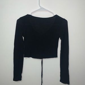 Black crop top with strings that adjust shirt